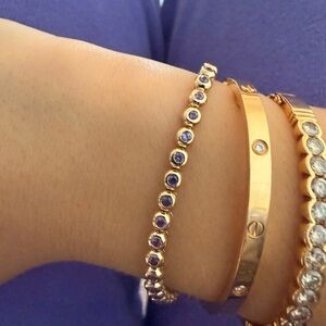Elegant Gold and Purple Bracelet